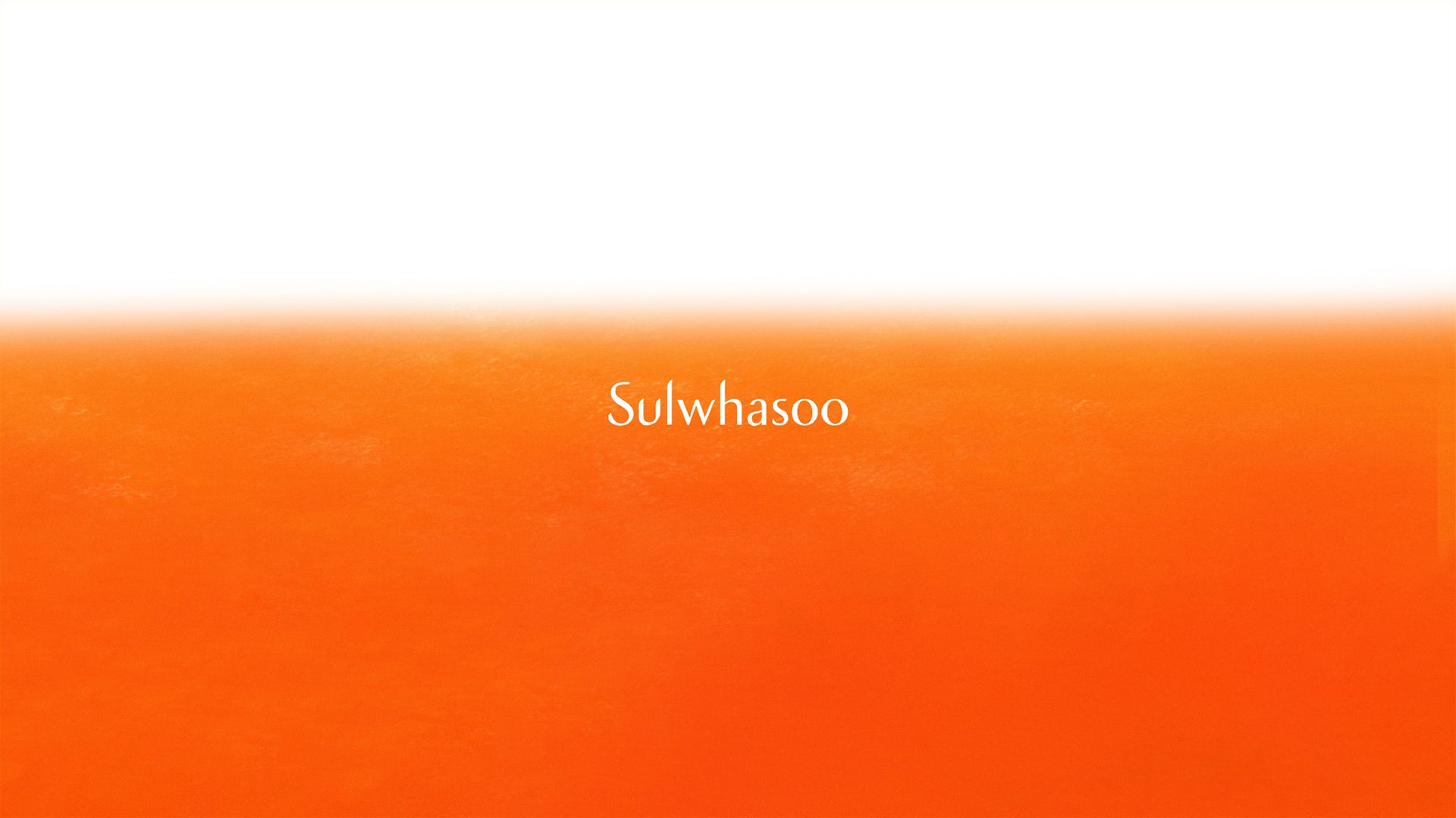 Image de Sulwhasoo : La Quintessence de la Beauté Traditionnelle Coréenne, fond orange avec le logo Sulwhasoo au centre