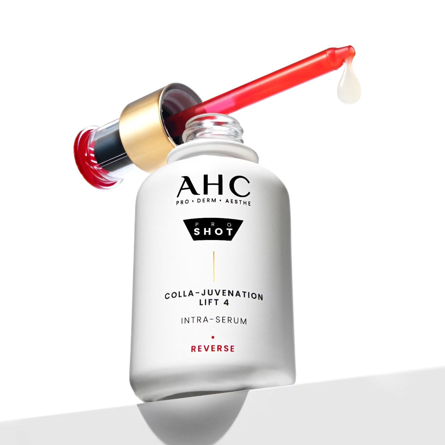 Flacon de 40ml de AHC Pro Shot Cola Juvenation Lift 4 Intra Serum, sérum anti-âge effet liftant avec pipette rouge.