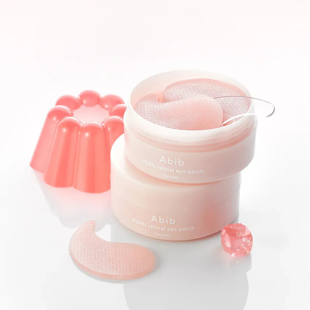 Décris l'image en français : ABIB PDRN Retinol Eye Patch Glow Jelly 30 Pairs, patchs de la marque ABIB sur fond clair.