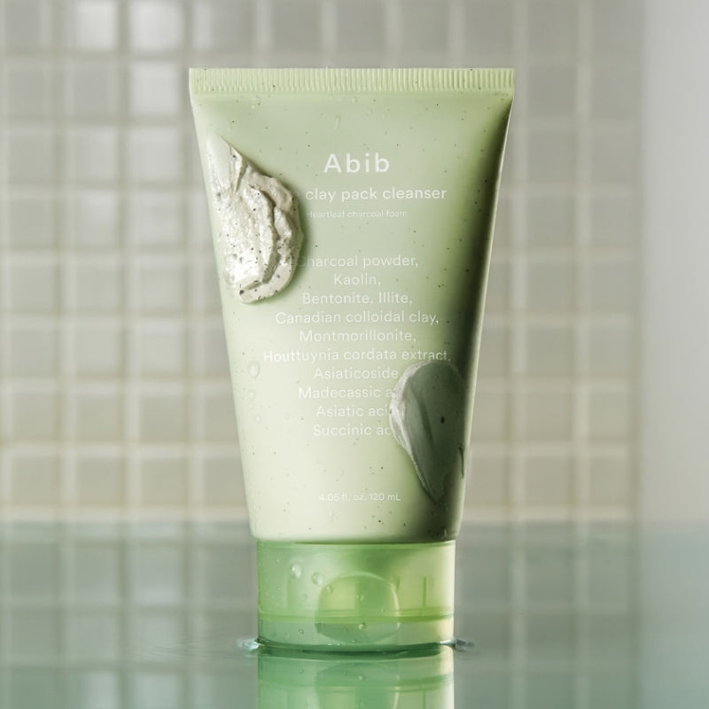 ABIB Pore Clay Pack Cleanser 120ml, tube de nettoyant à l’argile Abib sur fond clair, goutte de mousse visible