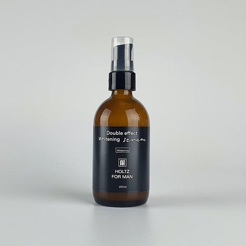 ANNA HOLTZ For Men Double Effect Whitening Essence 100ml : flacon brun sur fond clair, pompe doseuse, sérum blanchissant homme