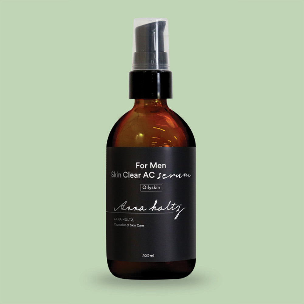 ANNA HOLTZ For Men Homme Men's Skin Clear Serum Essence 100ml : flacon sérum homme sur fond vert, vue produit.