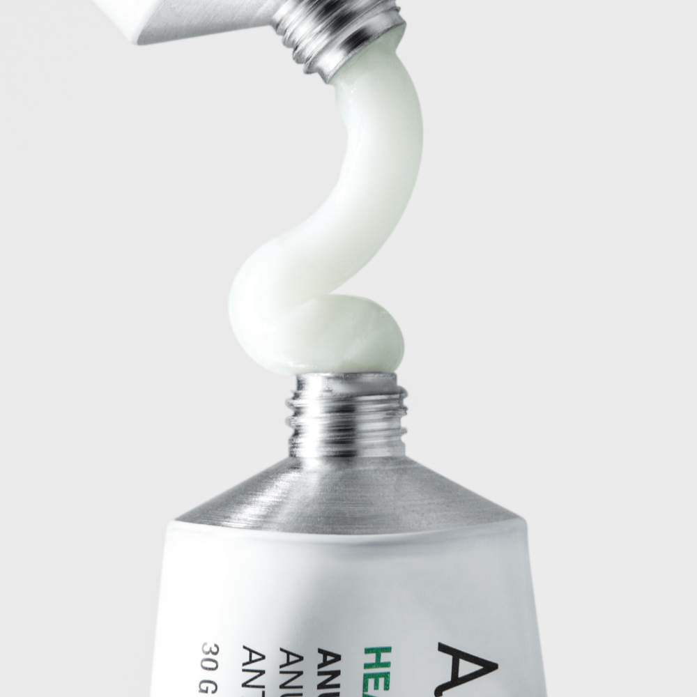 ANUA Heartleaf Centella Red Spot Cream 30g, tube crème ANUA vert sur fond blanc, goutte de texture, gros plan