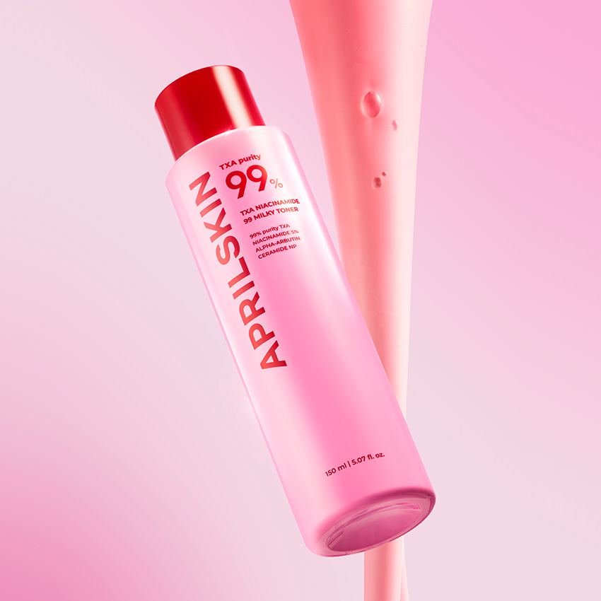 APRILSKIN TXA Niacinamide 99 Milky Toner 150ml de la marque APRILSKIN, flacon rouge sur fond rose.