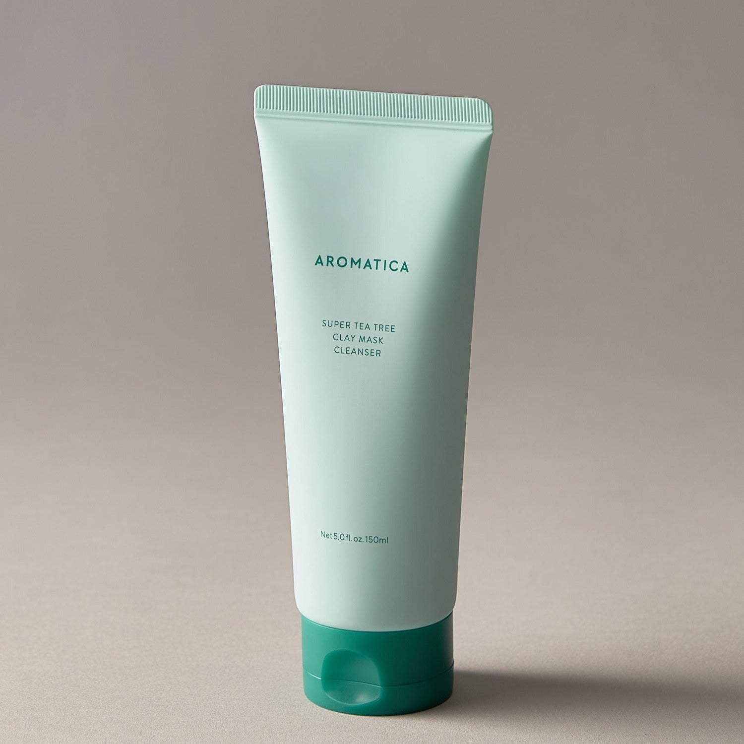 AROMATICA Super Tea Tree Clay Mask Cleanser 150ML, tube vert sur fond clair, soin visage à l’argile et tea tree
