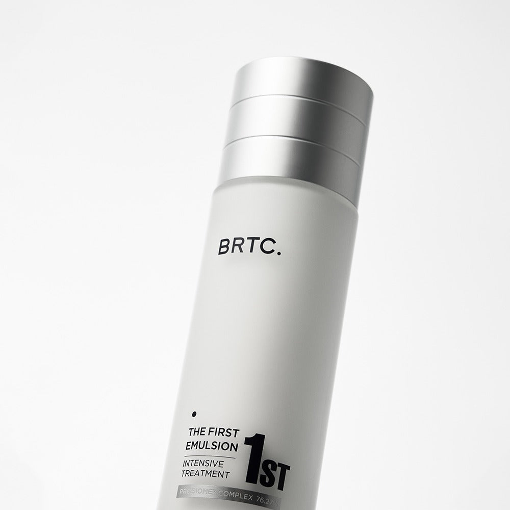 BRTC The First Emulsion 120ml, photo du flacon blanc et argent sur fond clair, marque BRTC, produit cosmétique