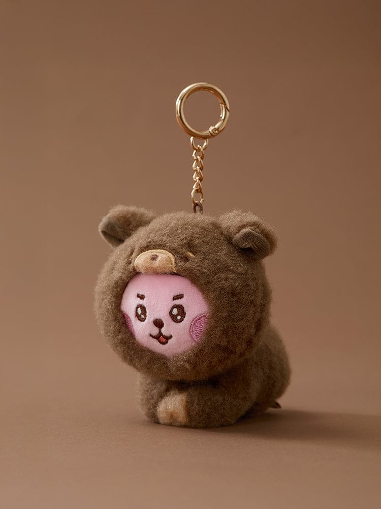BT21 BABY MORE FLUFFY PLUSH KEYRING, porte-clés peluche bébé grise avec personnage BT21 sur fond beige.