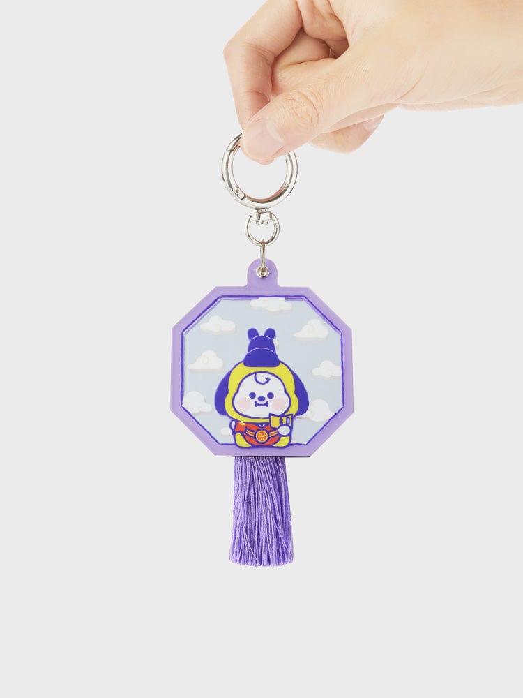 BT21 CHIMMY BABY MIRROR KEYRING K-EDITION ver.2 : porte-clés miroir CHIMMY avec pompon violet, main sur fond clair.