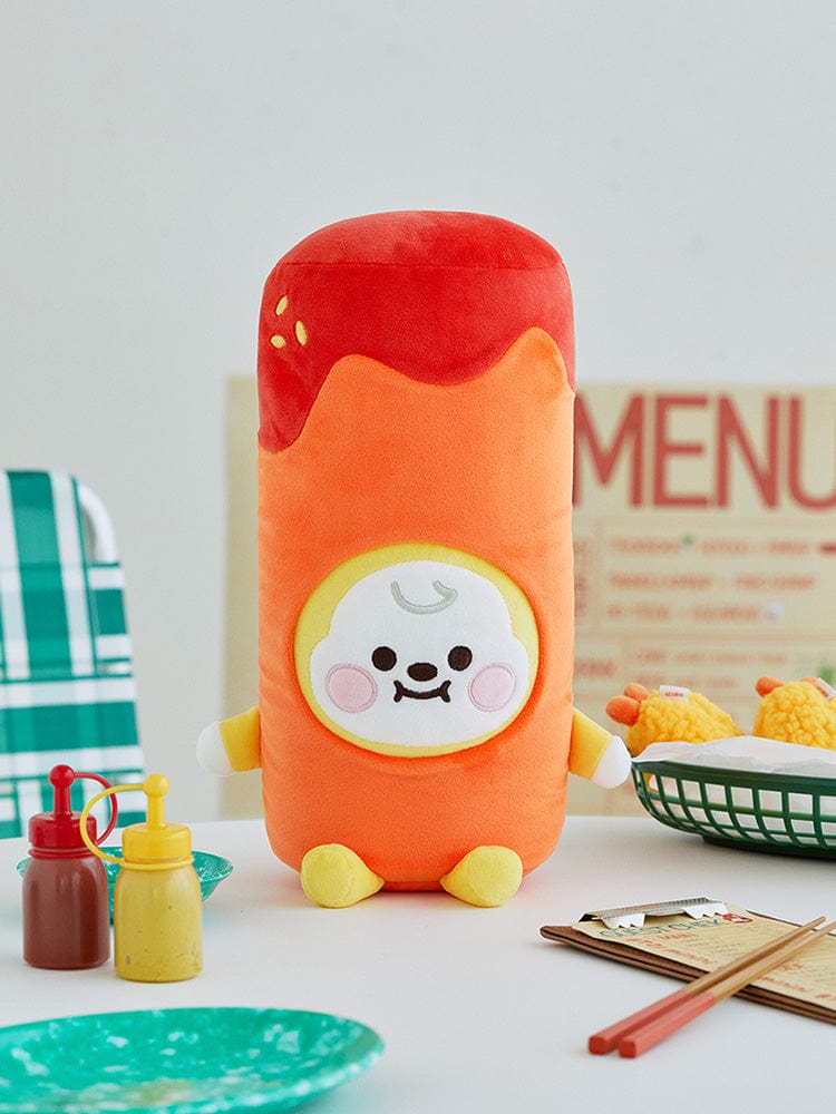 BT21 CHIMMY BABY PLUSH DOLL BUNSIK : peluche officielle CHIMMY orange sur bureau, ambiance bureau déco kawaii, BTS BT21.