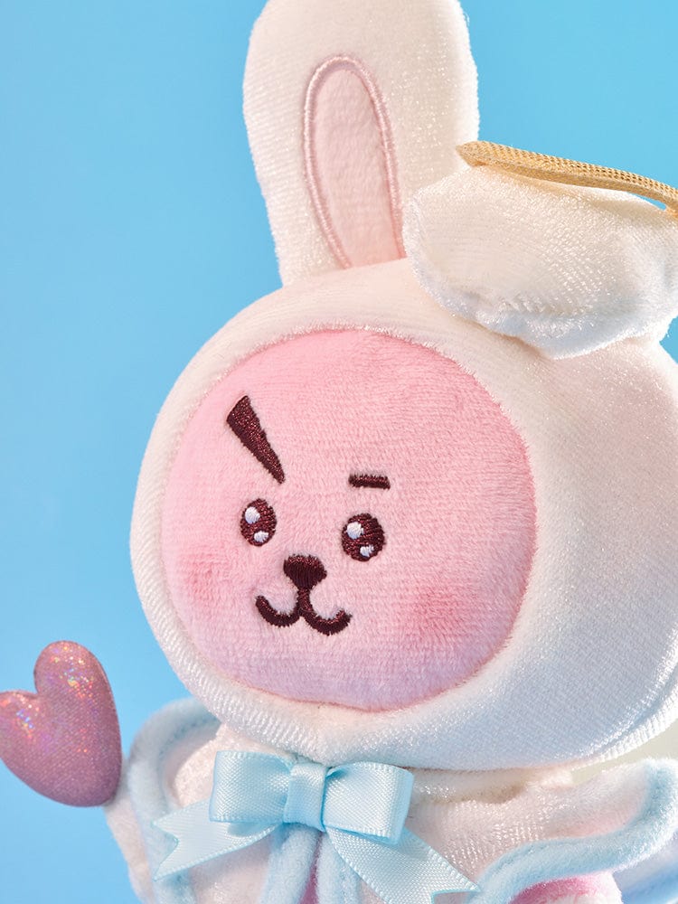 BT21 COOKY ANGEL PLUSH ANGEL & VILLAIN, peluche COOKY ange LINE FRIENDS sur fond bleu, détails visage et ailes