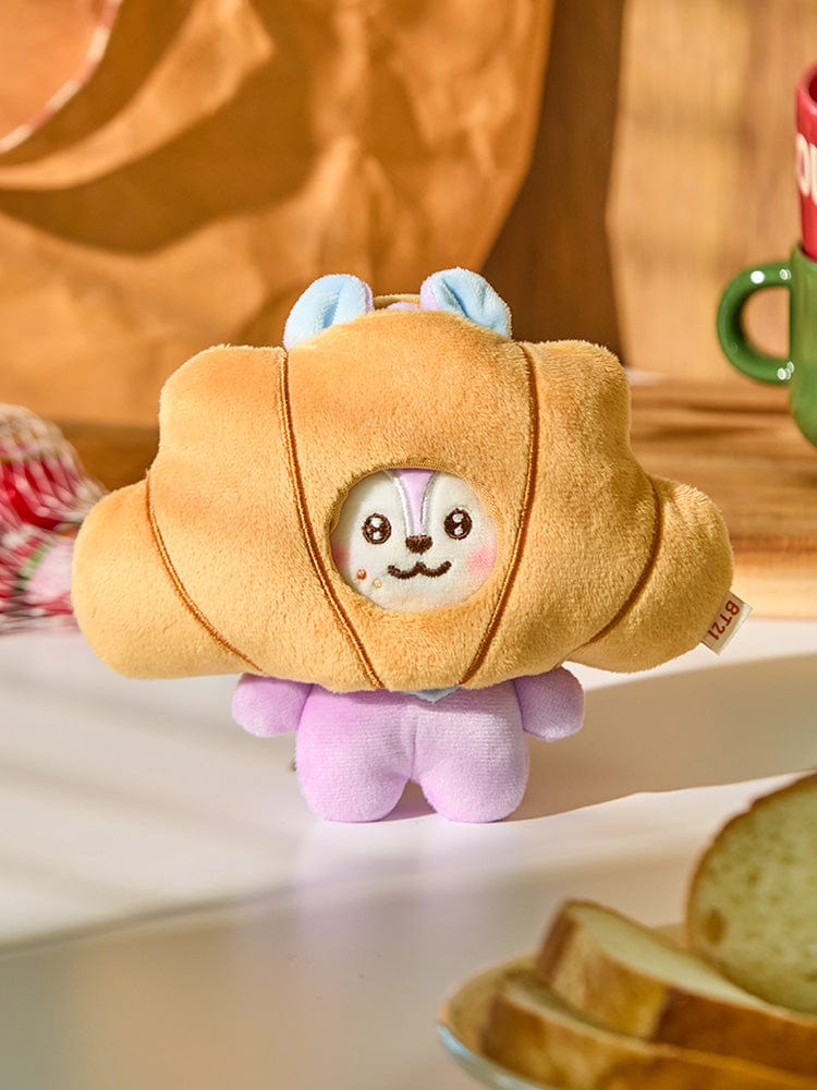BT21 MANG BABY COSTUME PLUSH DOLL BAKERY SHOP : peluche Mang bébé en costume de boulanger, décor pâtisserie.
