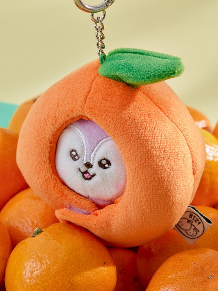 BT21 MANG BABY PLUSH KEYRING ORANGE PARTY : porte-clés peluche orange Mang j-hope BTS, fan K-pop, fond beige.