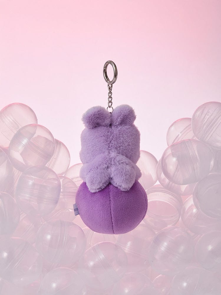 BT21 MANG minini PLUSH KEYRING LUCKY GATCHA : porte-clés peluche MANG violet sur fond rose, accessoire officiel BT21.