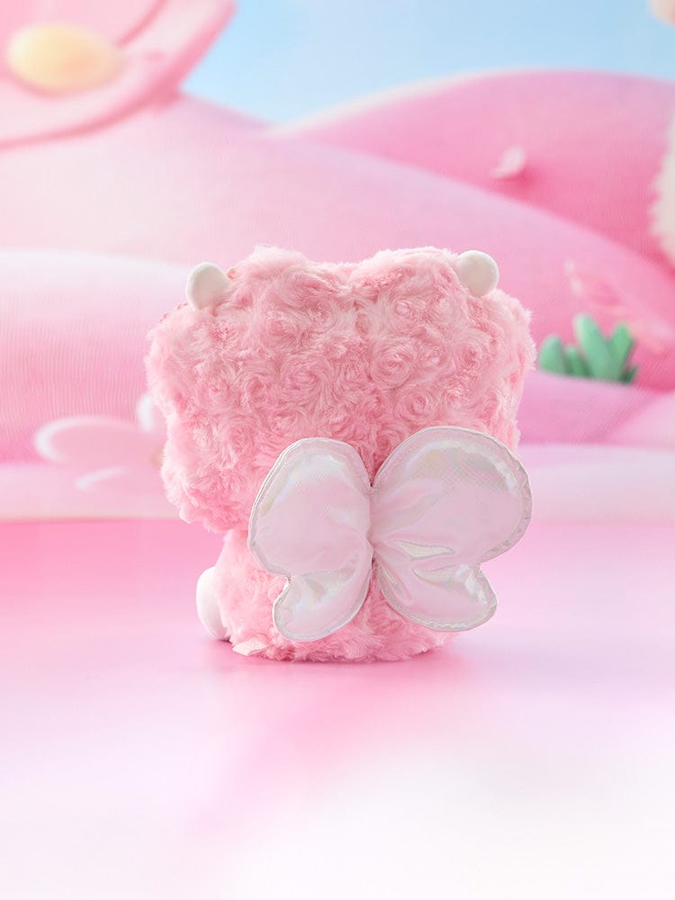 BT21 RJ BABY SITTING PLUSH SPRING FAIRY, peluche alpaga RJ de LINE FRIENDS, assise sur fond rose pastel, décor printanier