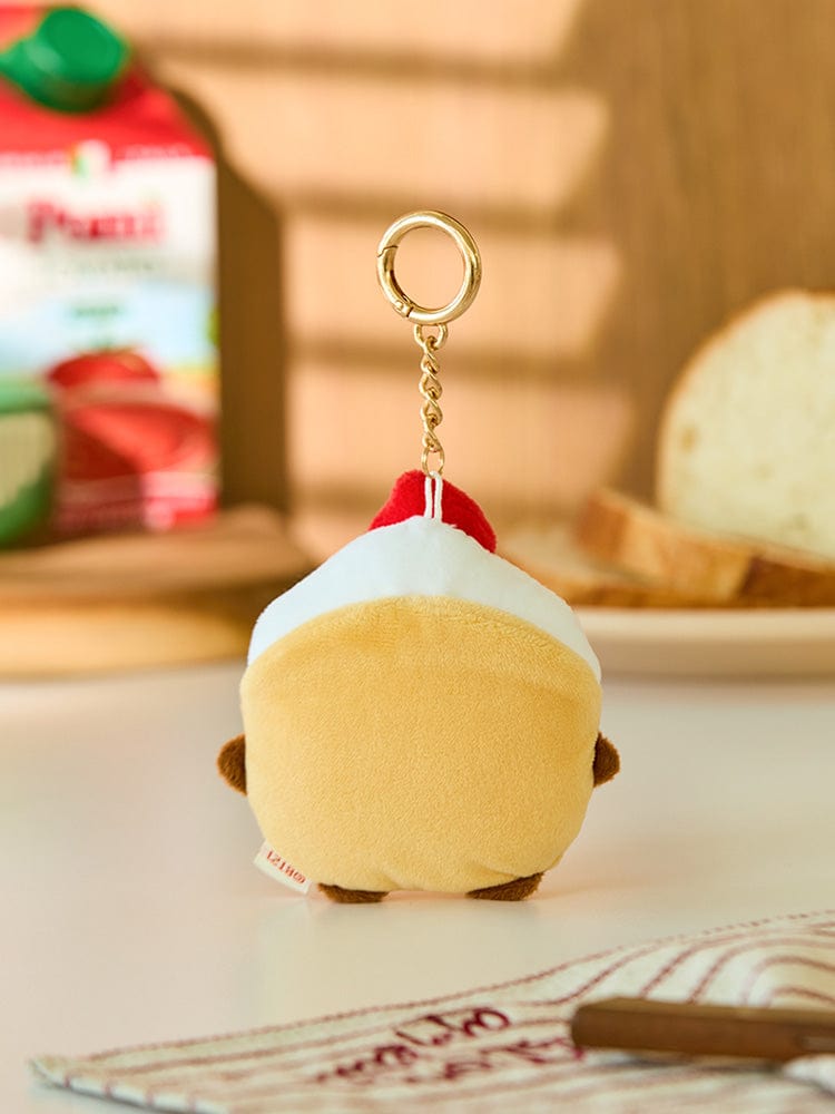 BT21 SHOOKY BABY PLUSH KEYRING BAKERY SHOP, porte-clés en peluche SHOOKY devant décor boulangerie LINE FRIENDS