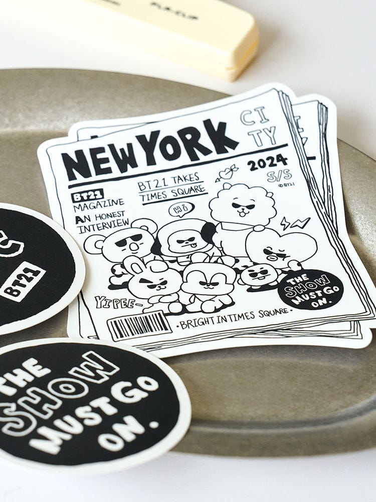 BT21 STICKER NEW YORK CITY EDITION : stickers officiels LINE FRIENDS avec personnages BT21 sur fond de bureau, style New York.