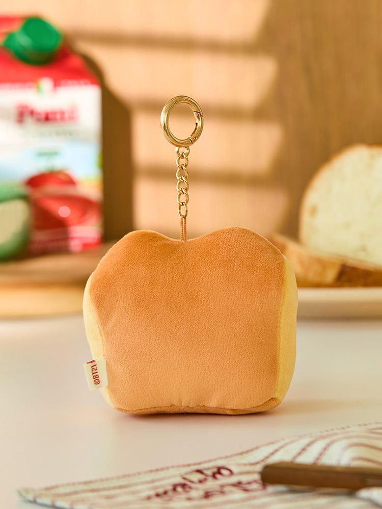 BT21 TATA BABY PLUSH KEYRING BAKERY SHOP, porte-clés peluche LINE FRIENDS en forme de pain, fond boulangerie.