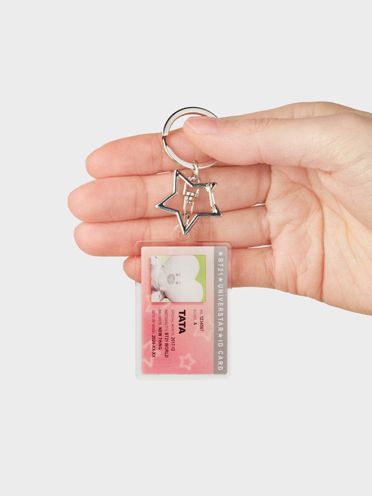 BT21 TATA ID CARD ACRYLIC KEYRING SILVER EDITION : porte-clés acrylique argenté TATA LINE FRIENDS, main tenant l’ID sur fond clair.