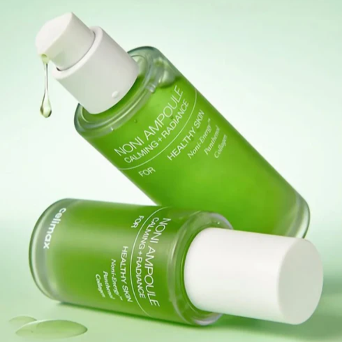 CELIMAX Noni Ampoule Calming+Radiance 30ml, flacon vert et blanc sur fond vert pastel, ampoule skincare apaisante