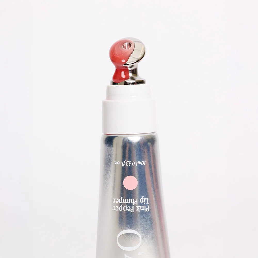 GLPHYO Pink Pepper Lip Plumper 10ml, flacon cosmétique rose avec embout applicateur, photo produit sur fond clair.