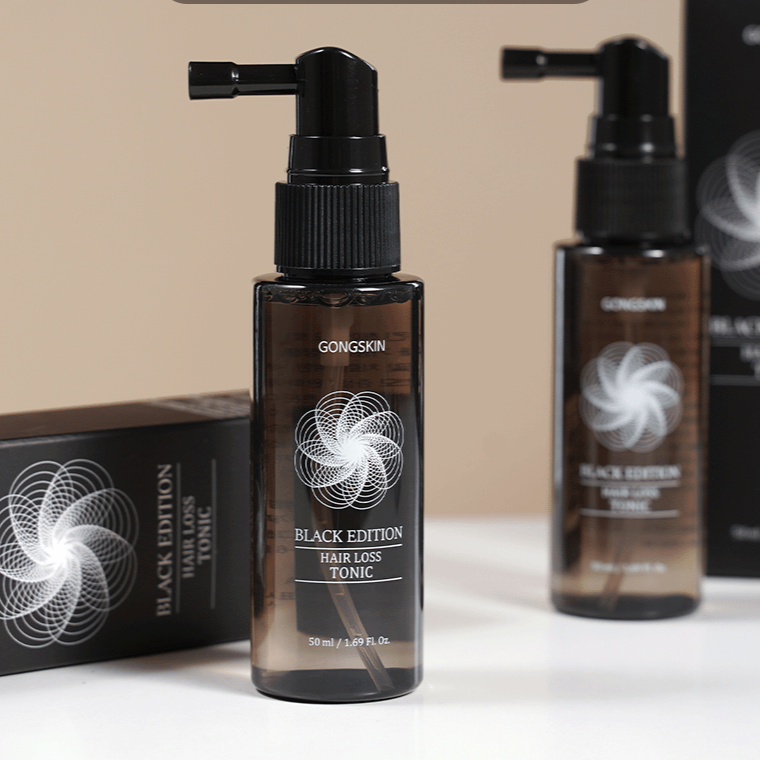 GONGSKIN Backup Hair Hair Loss Tonic 50ml, flacon noir sur table, décor salle de bain, marque GONGSKIN, fond flou.