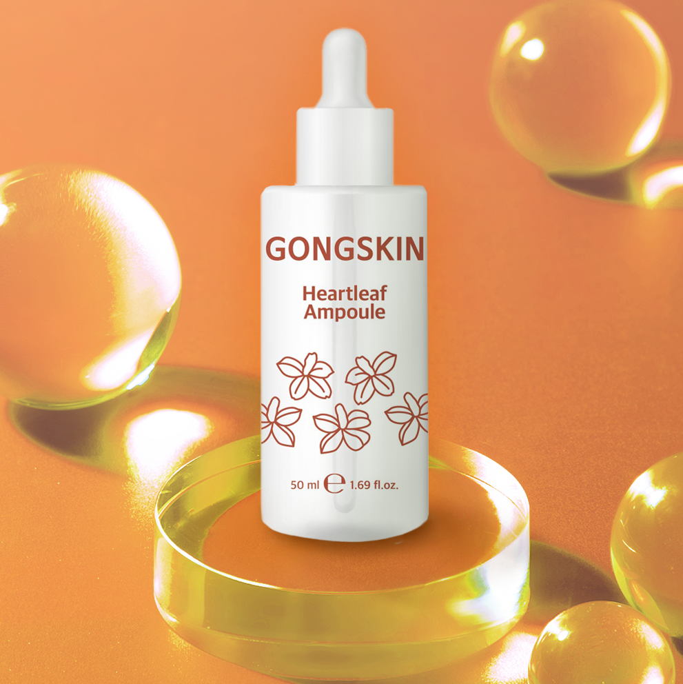 GONGSKIN Heartleaf Ampoule 50ml, flacon en studio sur fond orange avec bulles dorées, marque GONG SKIN visible
