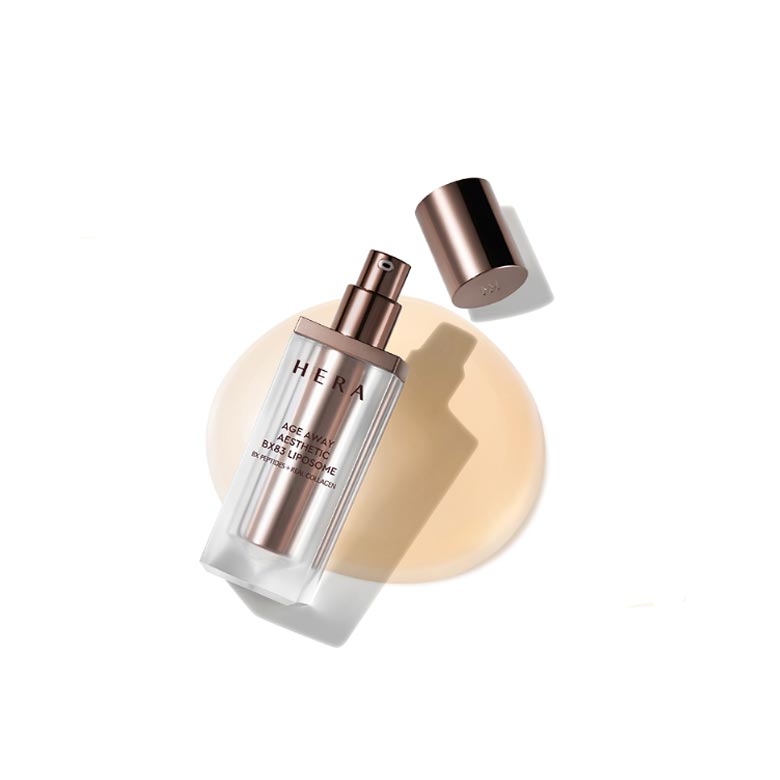 HERA Age Away Aesthetic BX83 Liposome 40ml, sérum liposomal sur fond clair, flacon HERA et gouttes esthétiques
