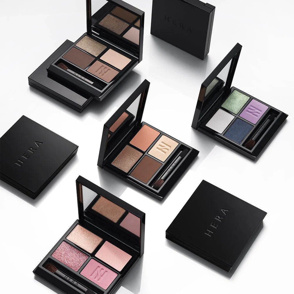 HERA Quad Eye Color : palette maquillage yeux HERA, boîtier noir, dégradés de couleurs, sur fond blanc.
