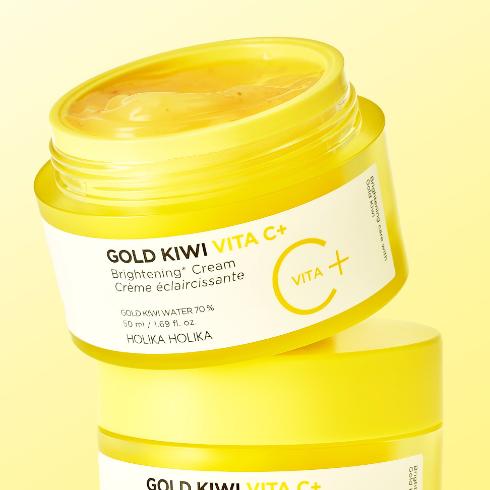 HOLIKA HOLIKA Gold Kiwi Vita C+ Brightening Cream 50ml, crème jaune au kiwi, pot sur fond jaune en studio