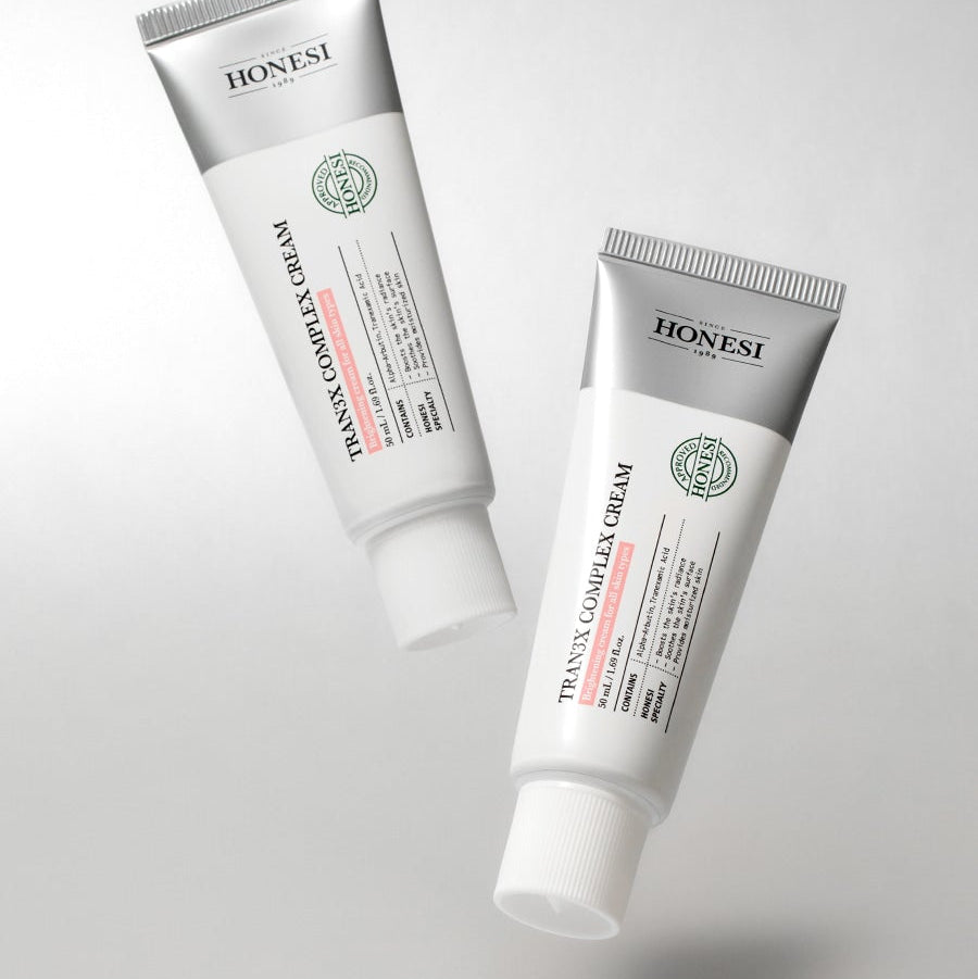 HONESI Tranex Complex Cream 50ml, tube de crème cosmétique de la marque HONESI sur fond blanc.