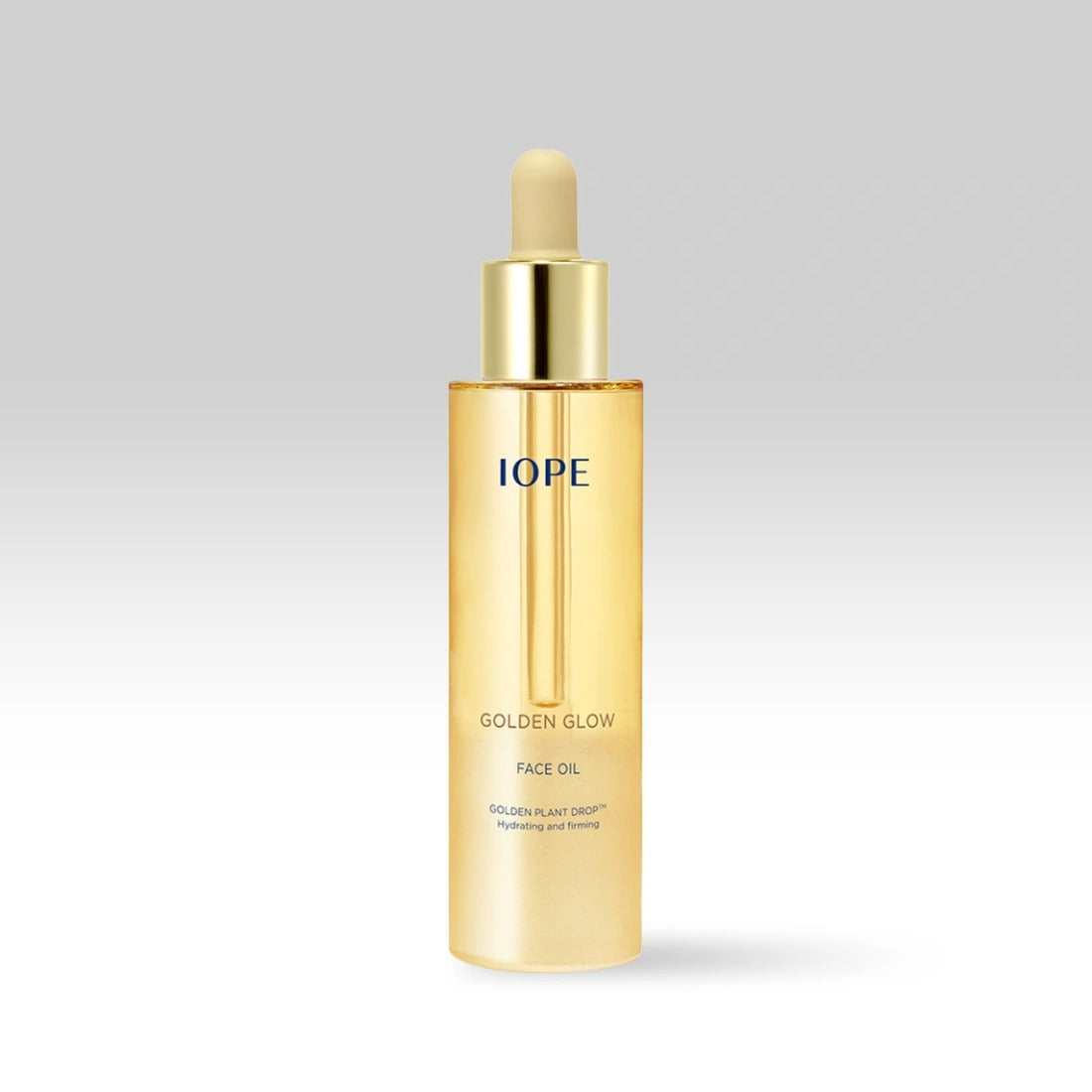 IOPE Golden Glow Face Oil 40ml, flacon doré sur fond clair, huile visage de la marque IOPE, lumière élégante.