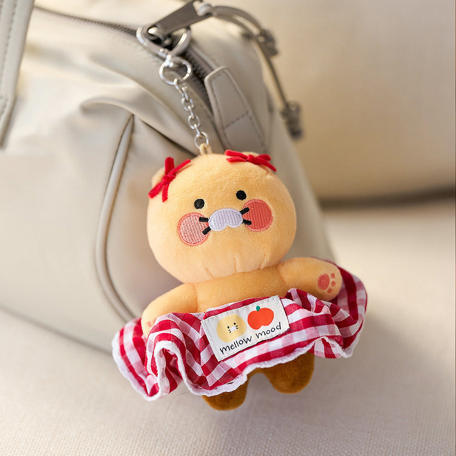 KAKAO FRIENDS Scrunchie Keyring Check : porte-clés mignon avec scrunchie à l’effigie de Ryan, sur sac beige