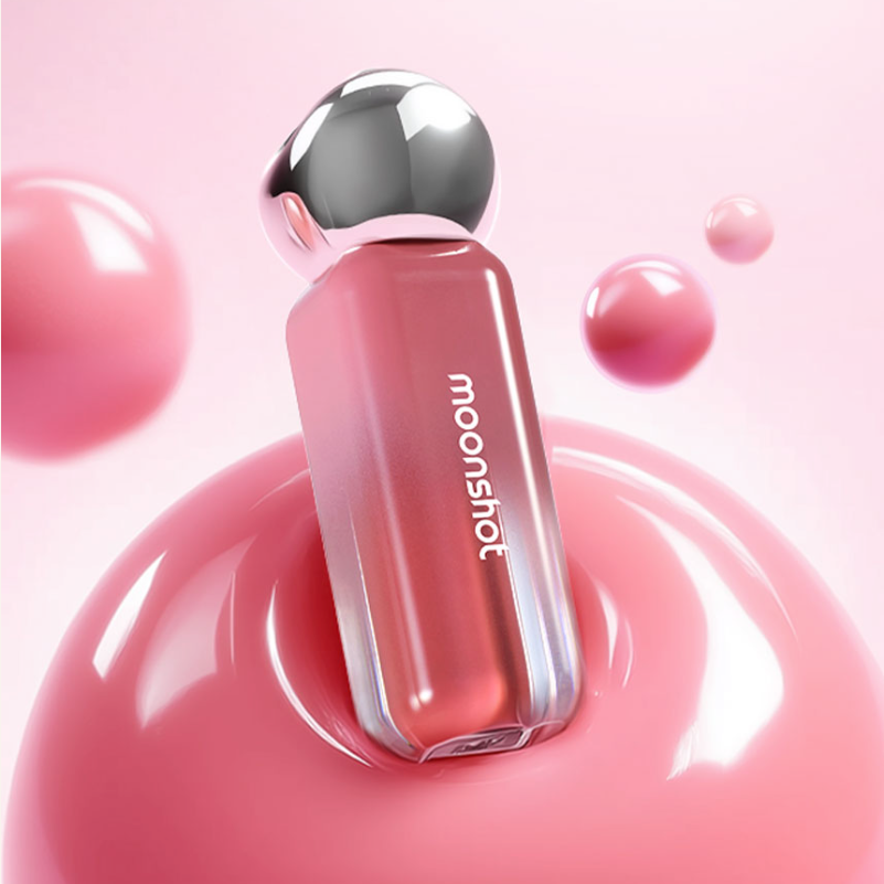 MOONSHOT Jelly Moon Glow Tint : flacon rosé brillant de la marque, bulles et gelée rose en fond pastel.