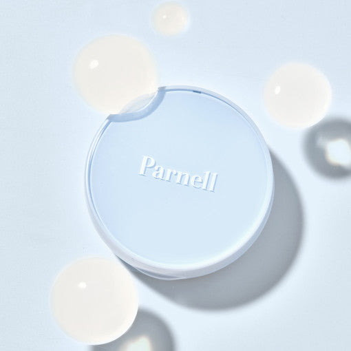 PARNELL Glacial Biome Water No Sebum Cushion de Parnell, pot blanc sur fond bleu glacé avec reflets lumineux