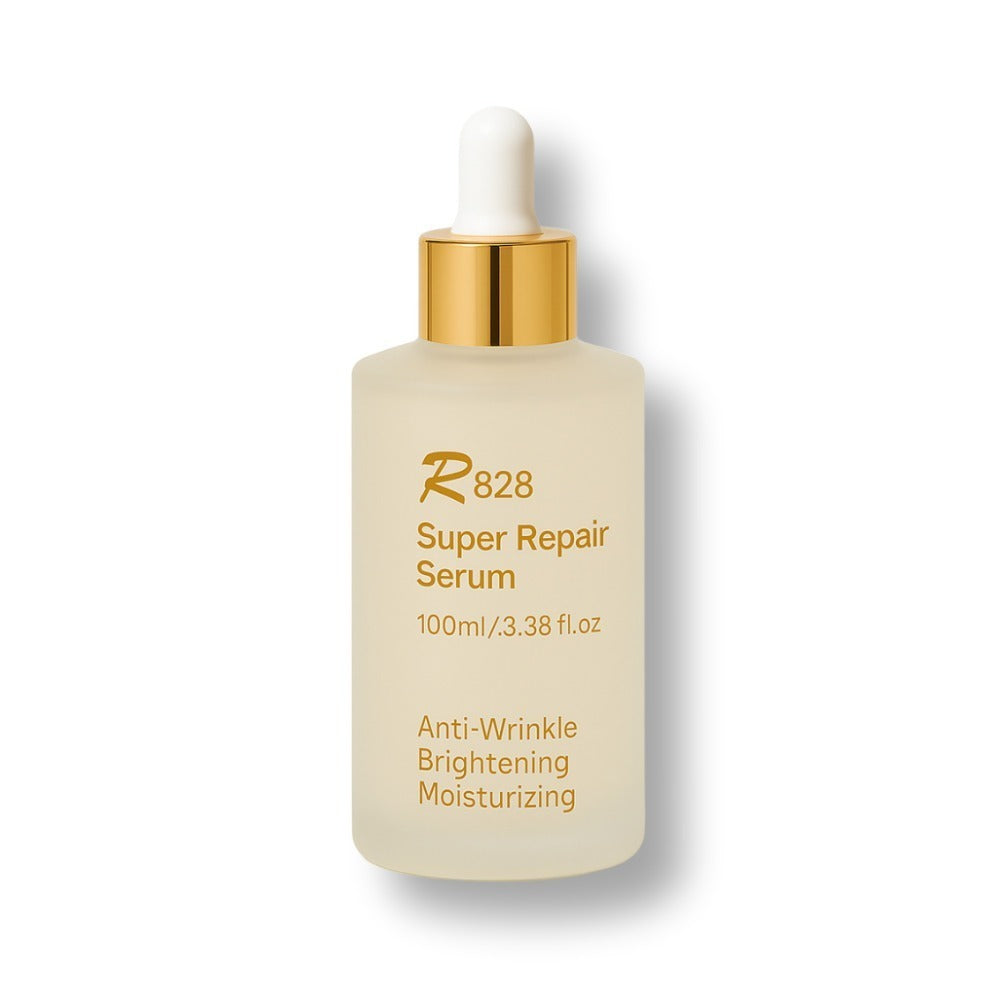 R828 Super Repair Serum 100ml de la marque R828, flacon sérum blanc et or sur fond clair (visuel produit)