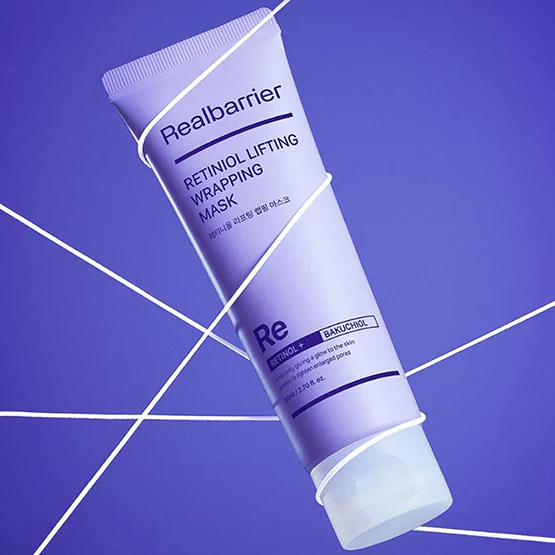 REAL BARRIER Retiniol Lifting Wrapping Mask 80ml de la marque Realbarrier, tube cosmétique sur fond bleu.