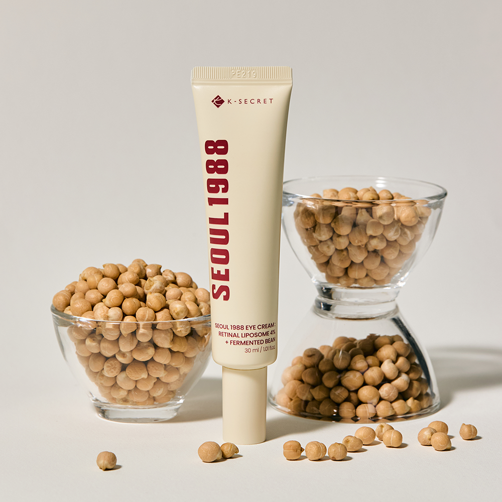 SEOUL 1988 Retinal Fermented Soybean Eye Cream 30ml K-Secret, tube beige sur fond clair avec soja fermenté et graines.