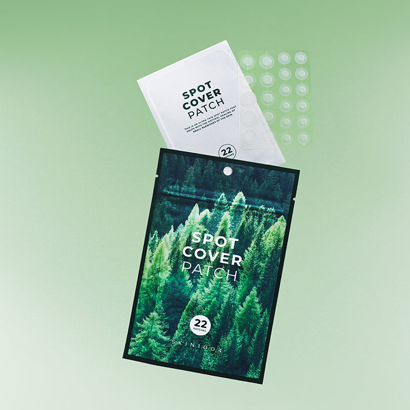 SKIN1004 Spot Cover Patch 22patch de la marque SKIN1004, sur fond vert, paquet et patchs visibles.