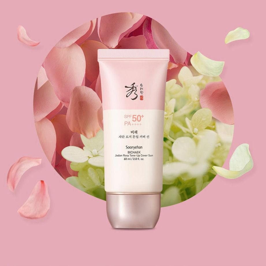Crème solaire SOORYEHAN Bichaekjadan Rosy Tone-up Cover Sun 60ml avec SPF 50+, fond de pétales rosés élégants.
