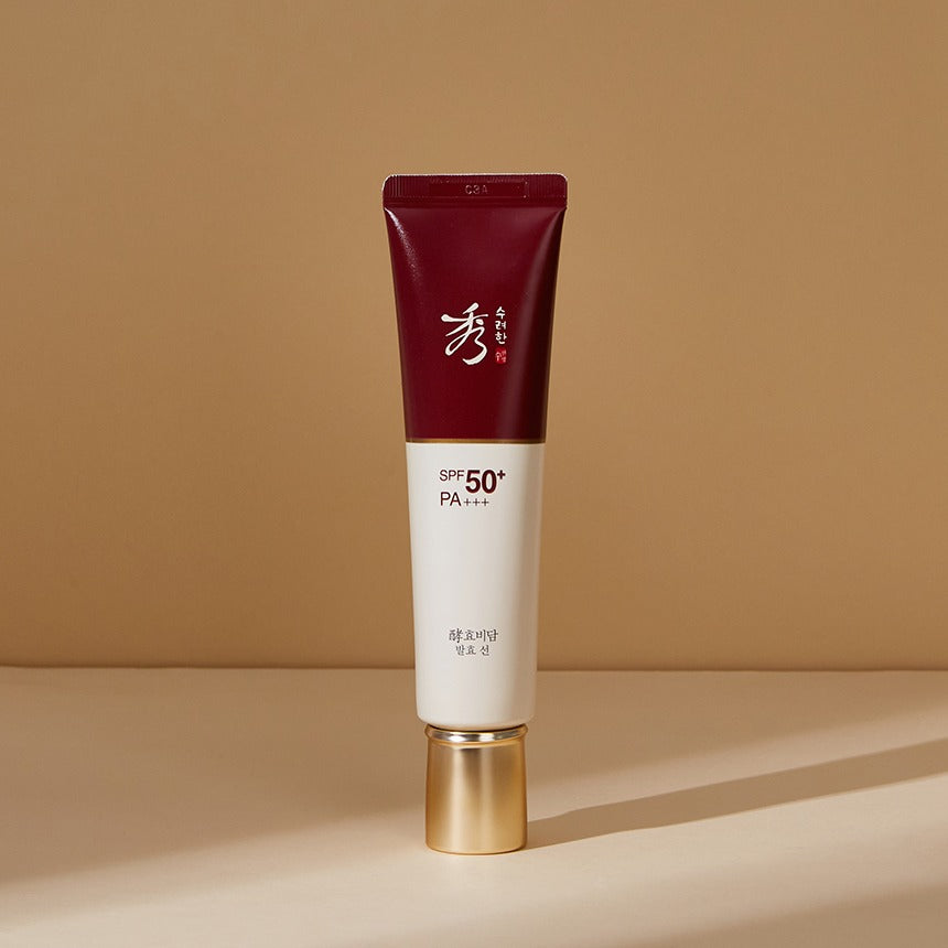 Tube de SOORYEHAN Hyobidam Fermented Sunscreen 60ml avec SPF50+ sur fond beige.