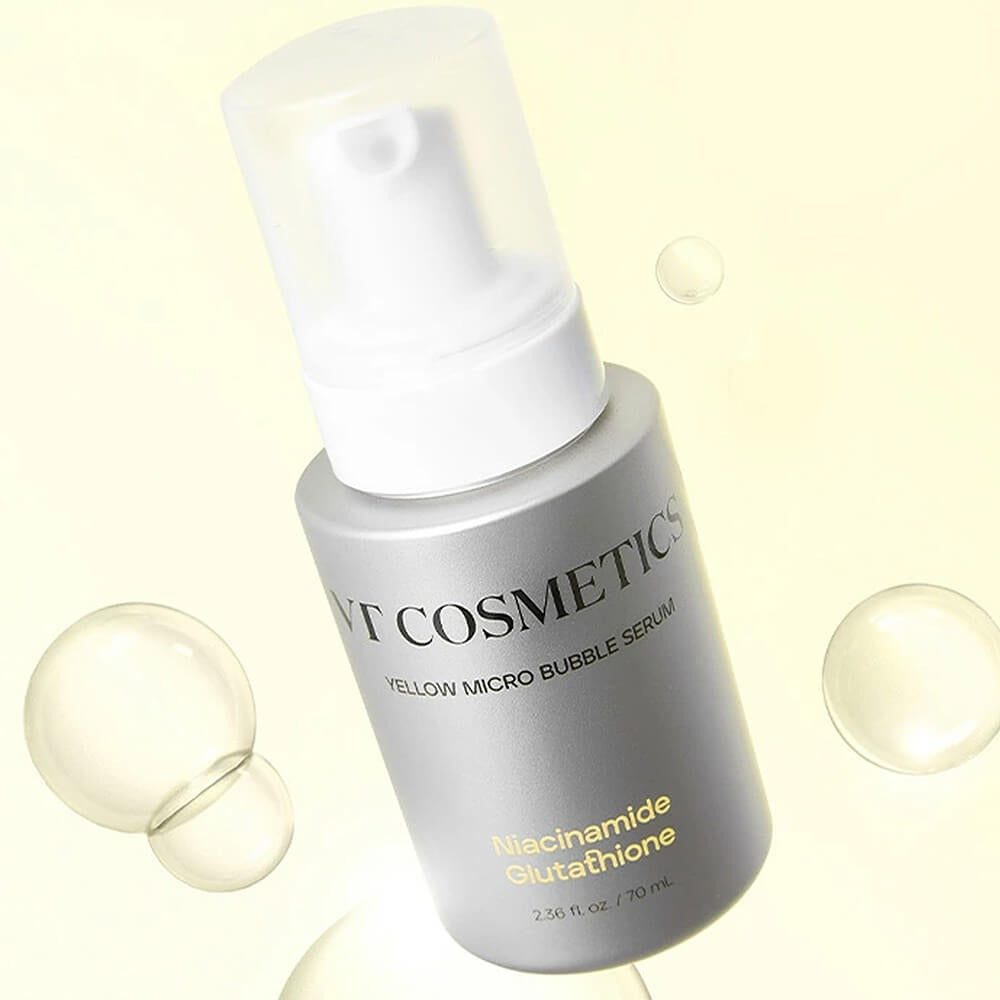 VT COSMETIC Niacinamide Glutathione Yellow Microbubble Serum 70ml en bouteille argentée et bulles en fond jaune.