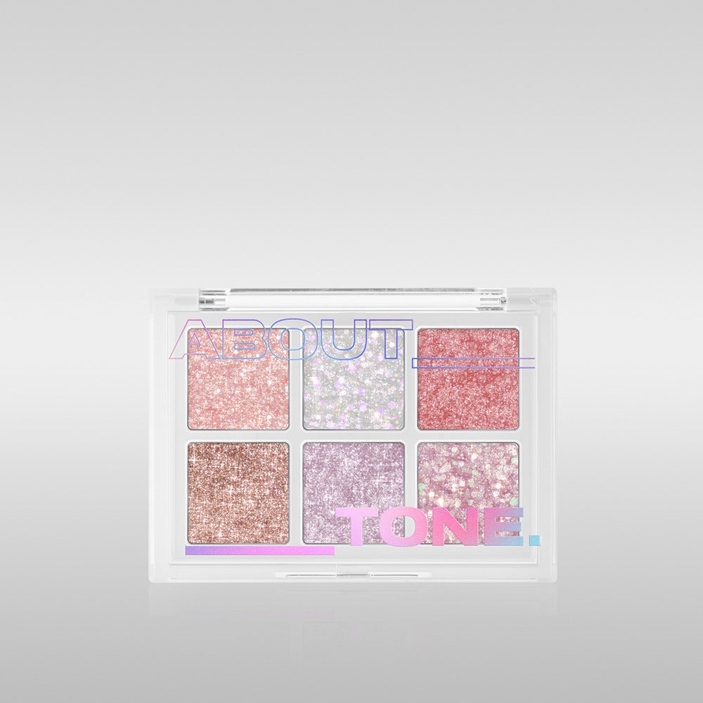 ABOUT TONE Oh My Glitter : palette de glitter roses et nacrés, packaging transparent sur fond clair, marque ABOUT TONE