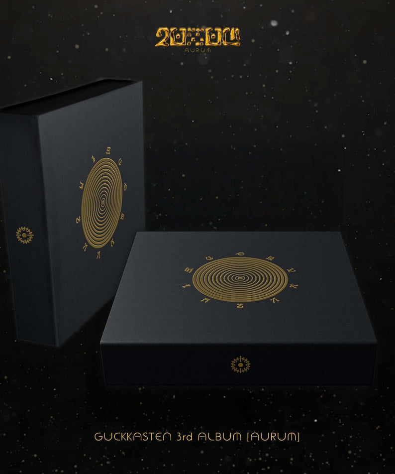 GUCKKASTEN - 3rd Album [AURUM] (AURUM VER.) - Album Kpop : coffret noir doré, design tourbillons, ambiance spatiale.