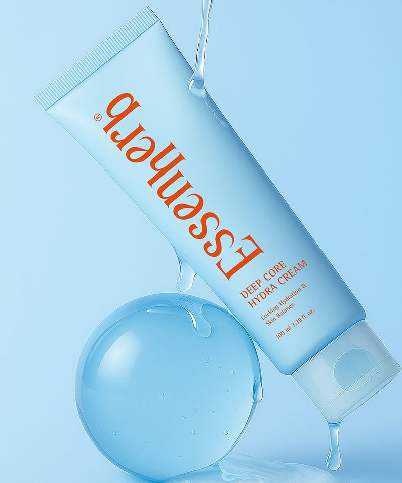 Crème ESSENHERB Deep Core Hydra Cream 100ml avec hydratation intense, tube sur fond bleu avec bulle d'eau.