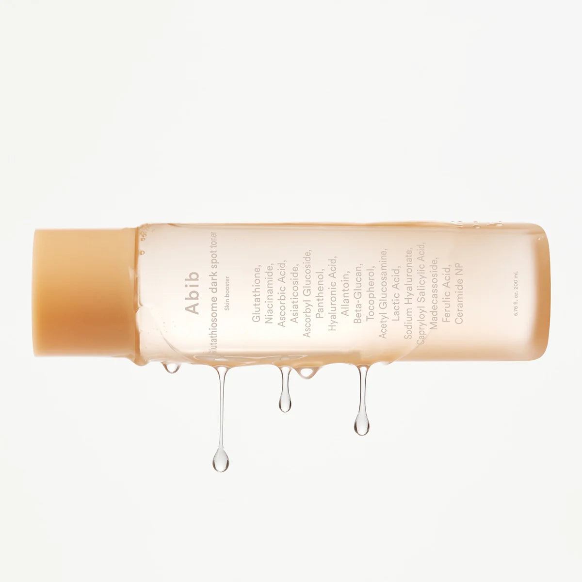 ABIB Glutathiosome Dark Spot Toner Skin Booster 200ml, flacon crème sur fond clair, flèches gouttes, marque ABIB