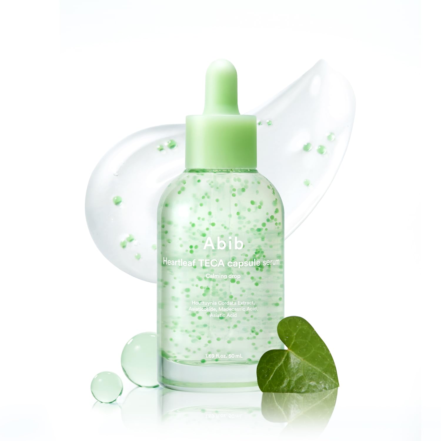 Décris l'image en français : ABIB Heartleaf TECA Capsule Serum Calming Drop 50ml, marque Abib, flacon vert apaisant.