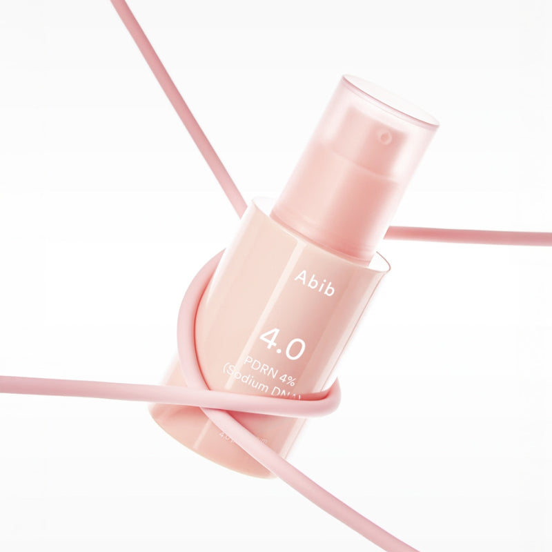 Décris l'image en français : ABIB  PDRN Glow Serum 30ml, flacon rose sur fond blanc avec lignes roses, cosmétique ABIB.