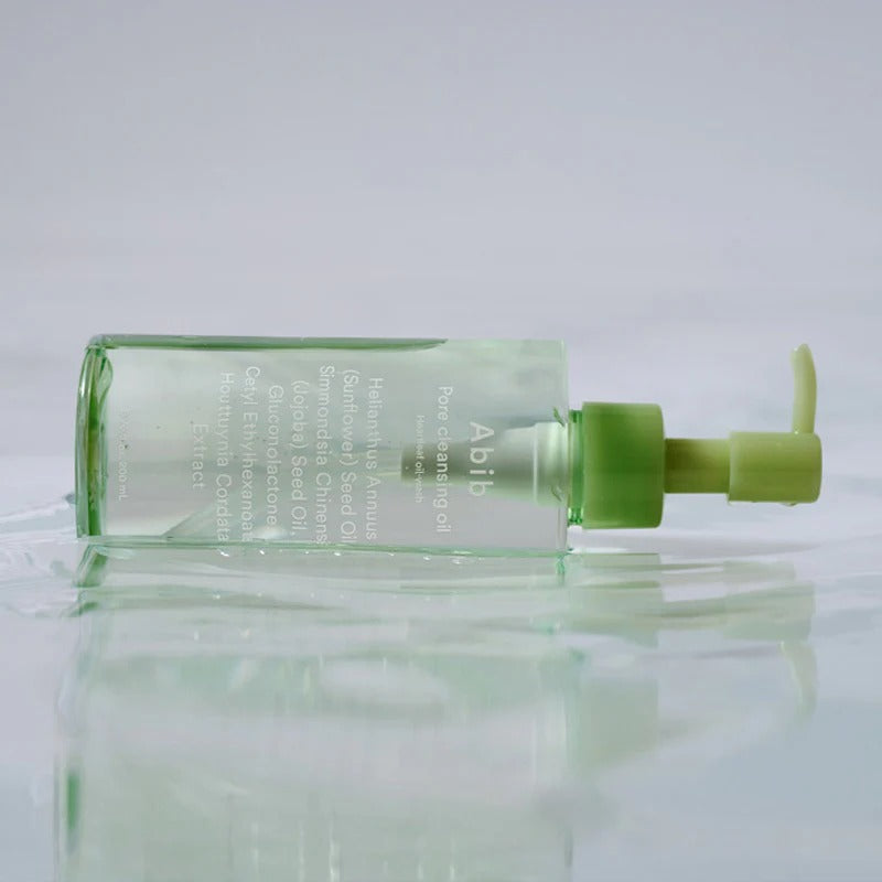 ABIB Pore Cleansing Oil Heartleaf Oil-Wash 200ml, flacon vert sur fond clair, contexte visuel skincare anti-pores