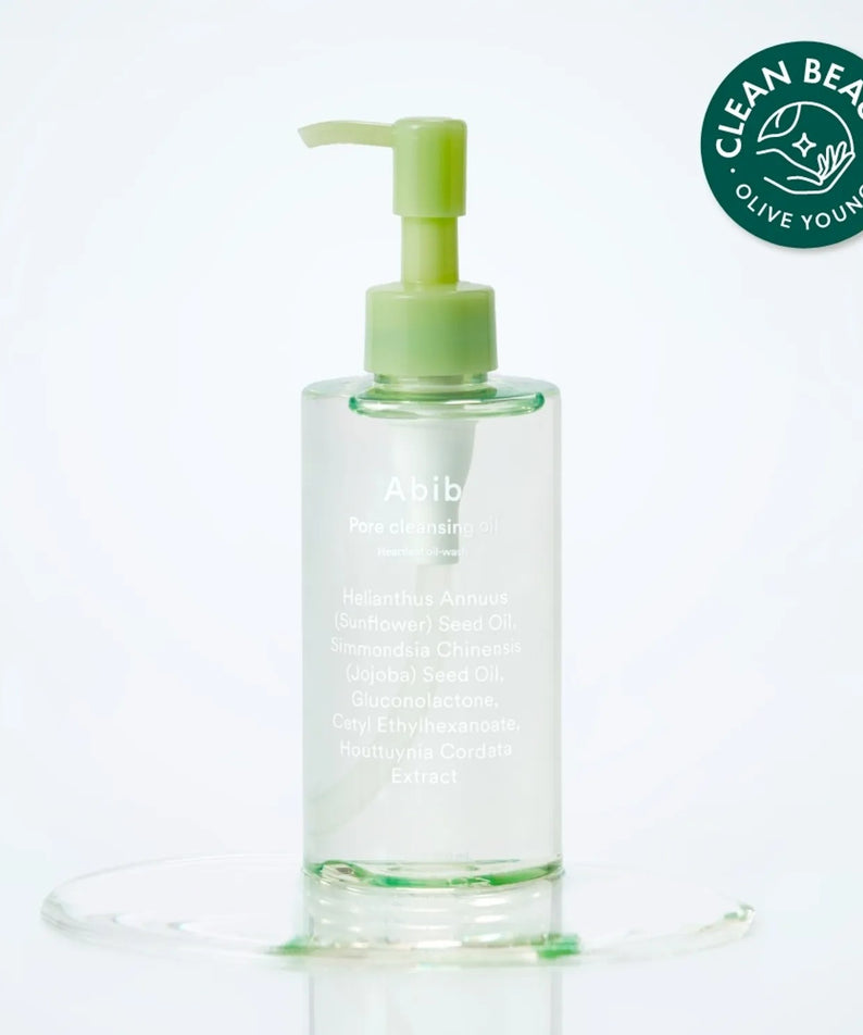 ABIB Pore Cleansing Oil Heartleaf Oil-Wash 200ml, flacon vert sur fond blanc avec gouttes d’huile, marque ABIB