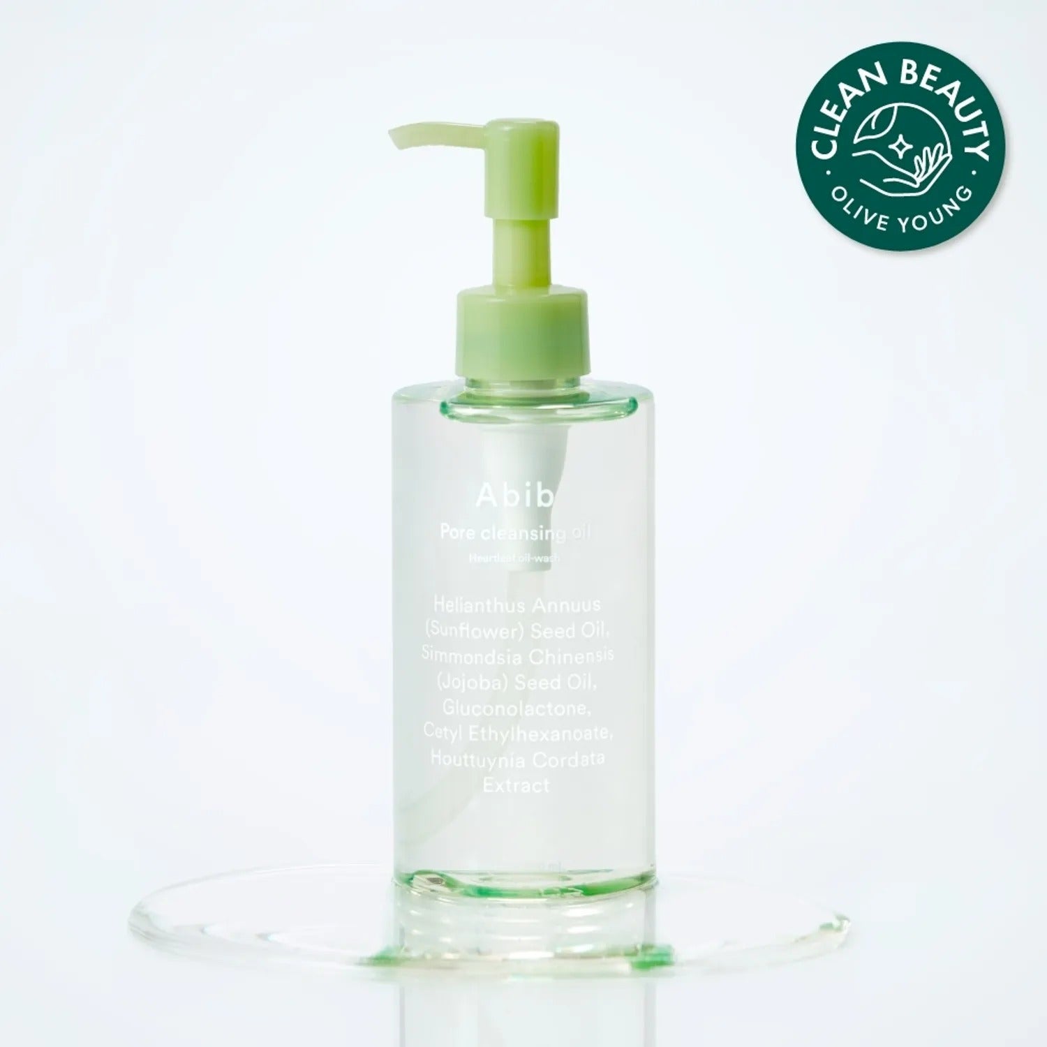 ABIB Pore Cleansing Oil Heartleaf Oil-Wash 200ml, flacon vert sur fond blanc avec gouttes d’huile, marque ABIB